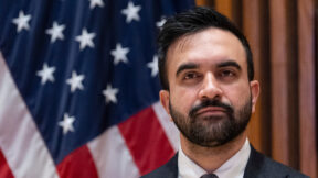 NYC Mayor Zohran Mamdani in front of an American flag