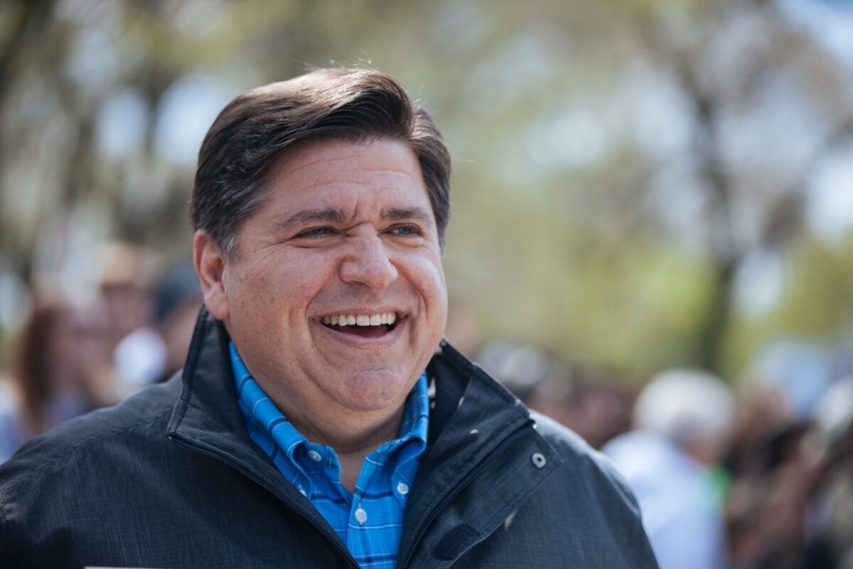 JB Pritzker laughing