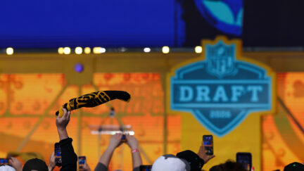 A fan waves a Terrible Towel during the 2026 NFL football draft, Saturday, April 25, 2026, in Pittsburgh. (Aaron M. Sprecher via AP)