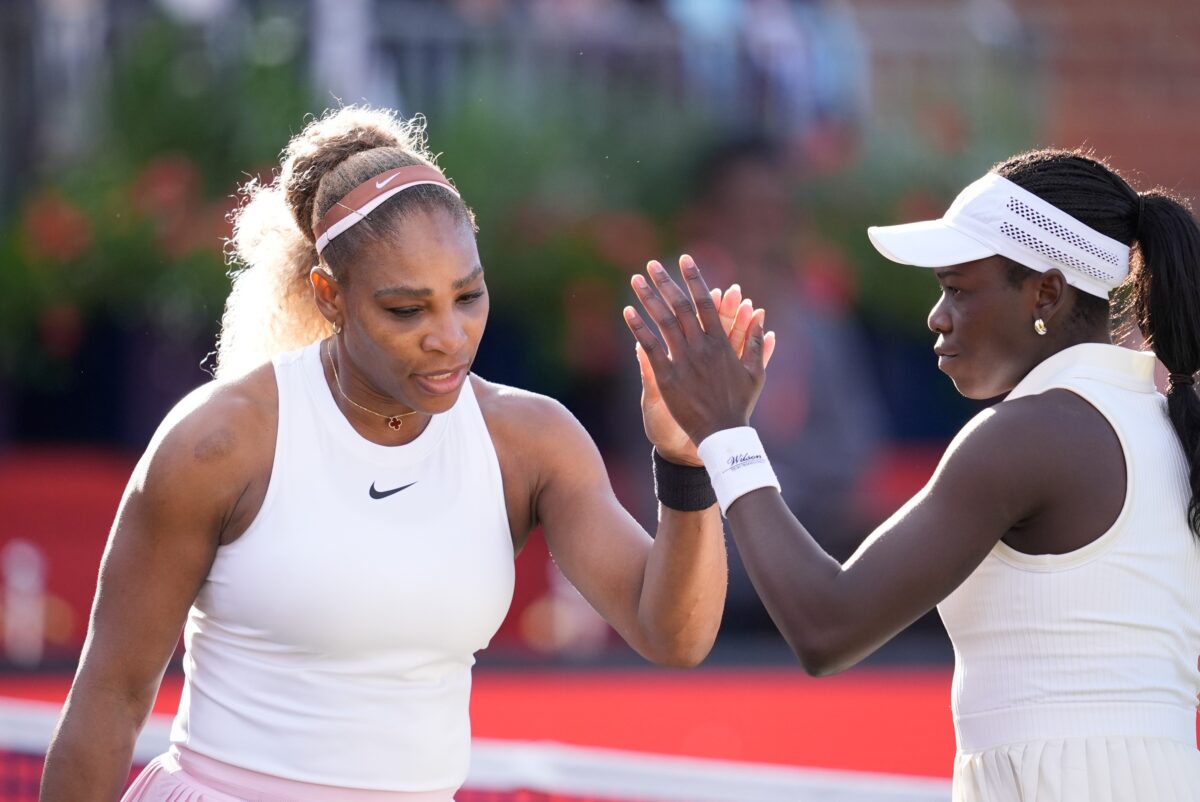 Serena Williams and Victoria Mboko compete during their round of 16 doubles match at The HSBC Championships 2026 women's tennis tournament at The Queen's Club in London, England, on June 9, 2026. (Photo by Owen Hammond/NurPhoto via AP)