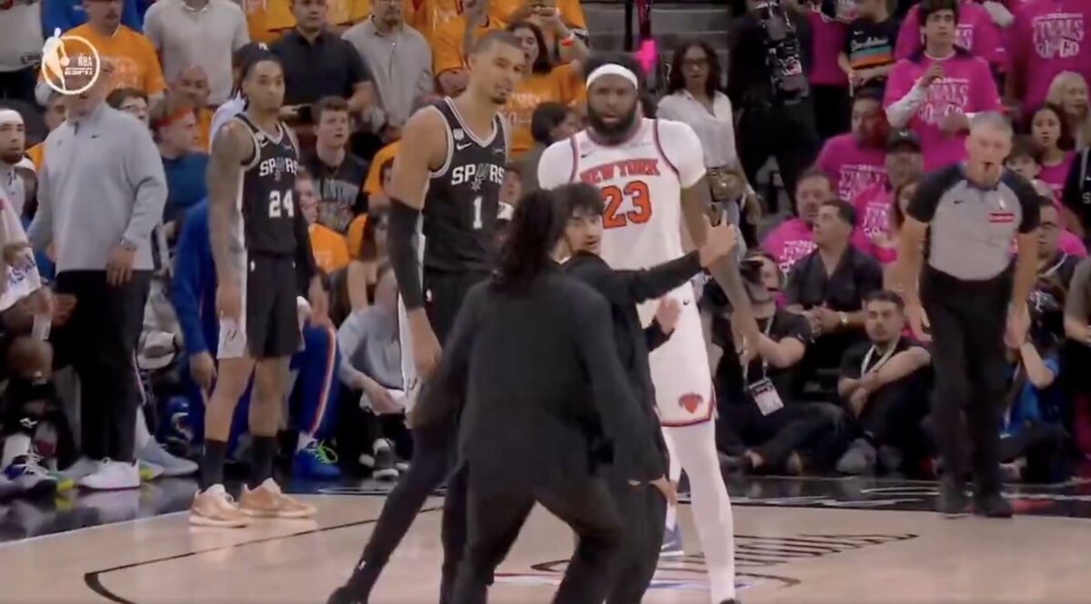 Fan storms court at Spurs-Knicks Finals