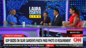 Laura Coates laughing with panel on olive garden take