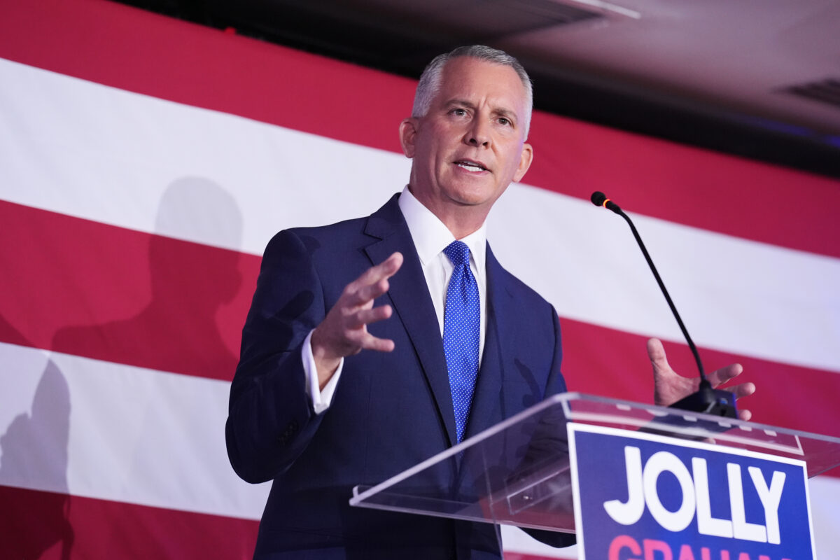 David Jolly in front of American flag